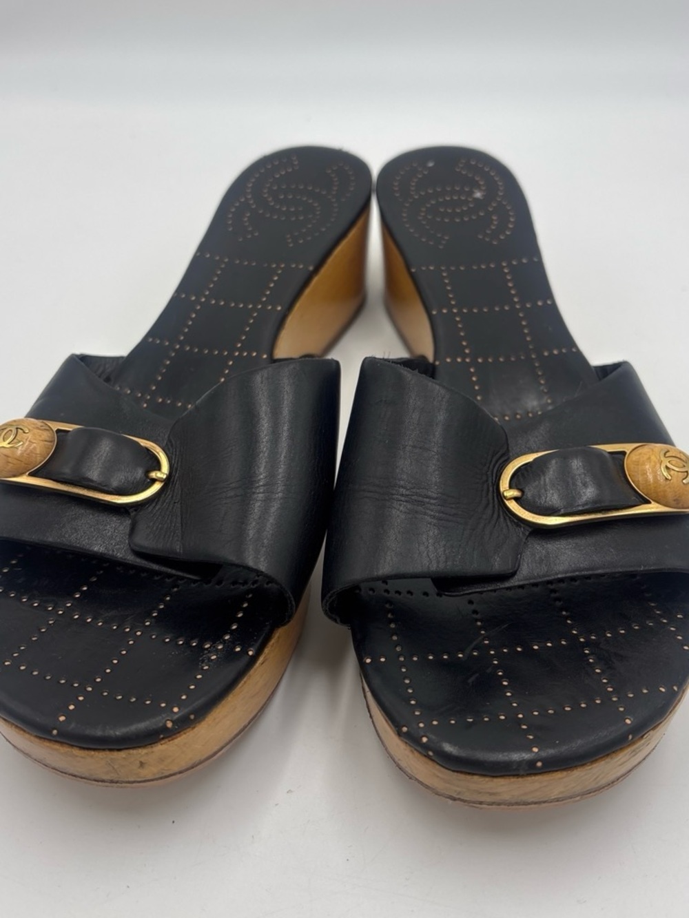 CHANEL Black Leather Slide Mules with Gold-Tone CC Buckle